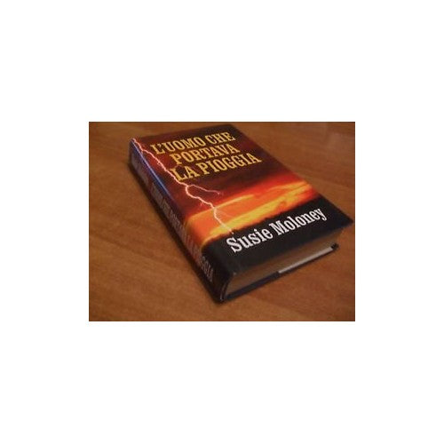 Book - THE MAN WHO CARRIED THE RAIN - Moloney Susie