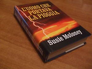 Libro - L'UOMO CHE PORTAVA LA PIOGGIA - Moloney Susie