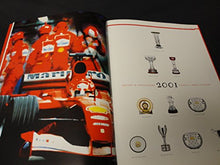 Carica l&#39;immagine nel visualizzatore di Gallery, Libro - Ferrari 2001: Campione Del Mondo Piloti, Campione Del Mondo Costruttori