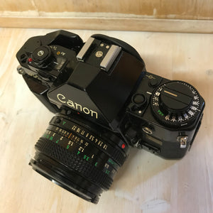 CANON A-1 analog camera with 2 lenses FD 50 100-200mm flash